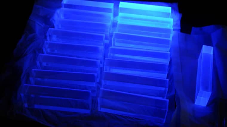 Blue glowing scintillator, black in the background.